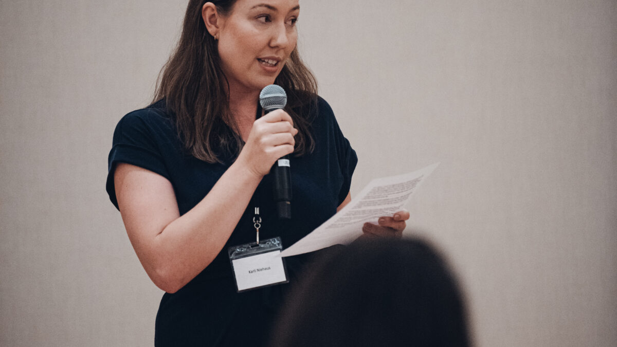 Young leader speaking at event