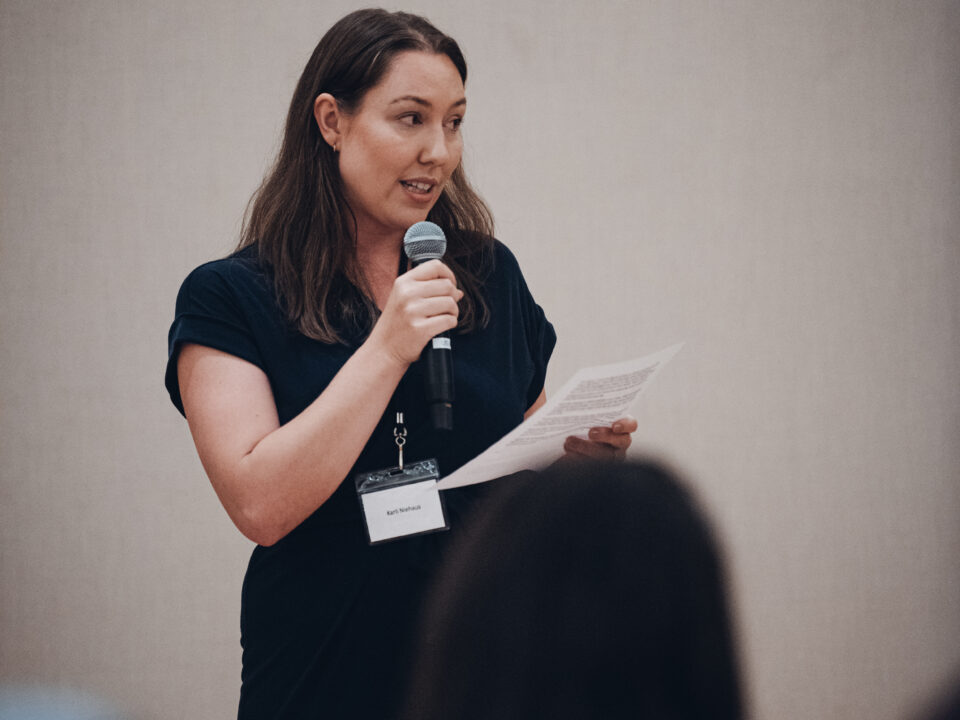 Young leader speaking at event