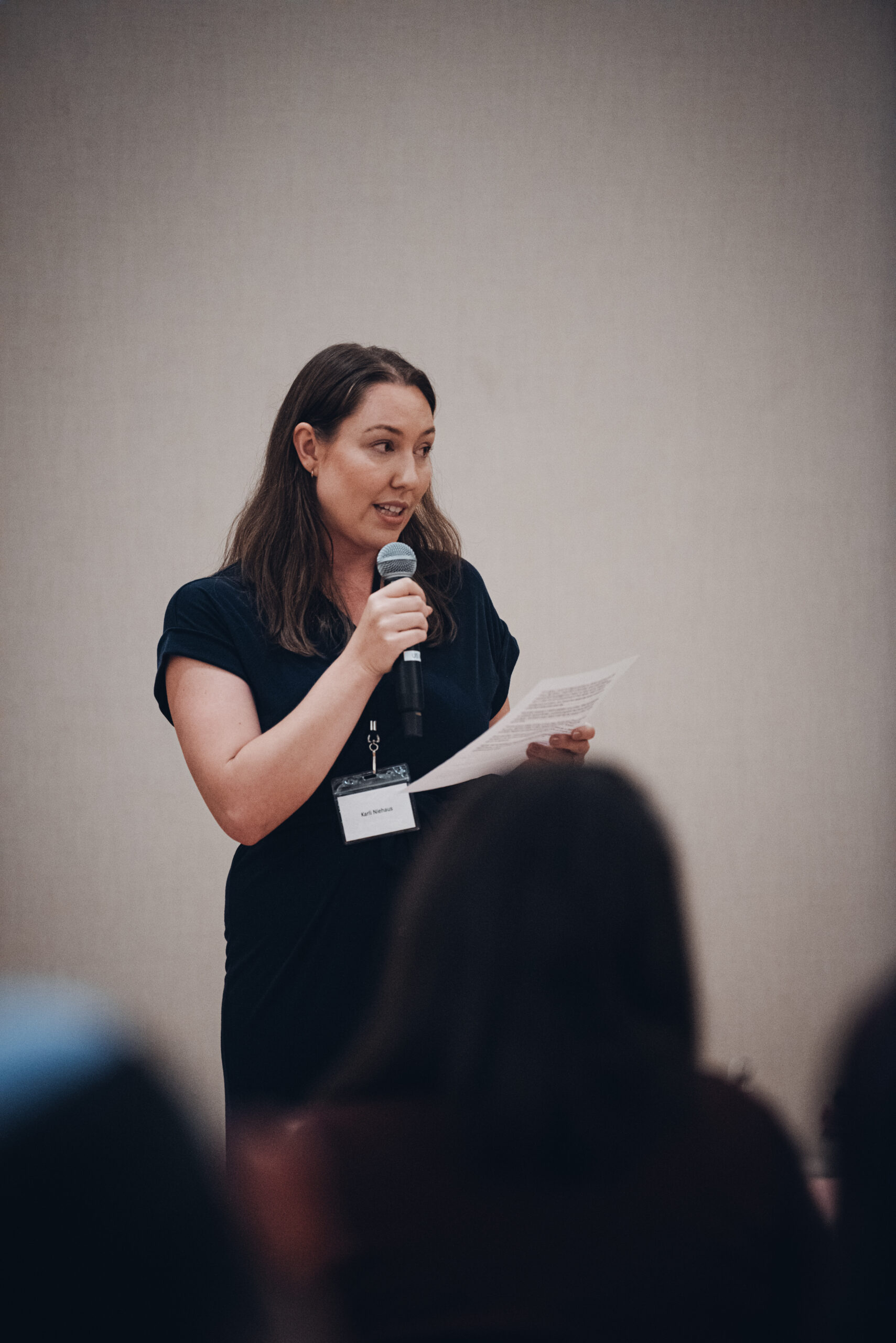 Young leader speaking at event